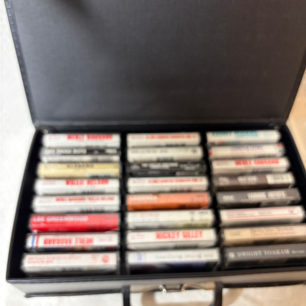 Vintage Cassette Tape Collection in Gray Case
